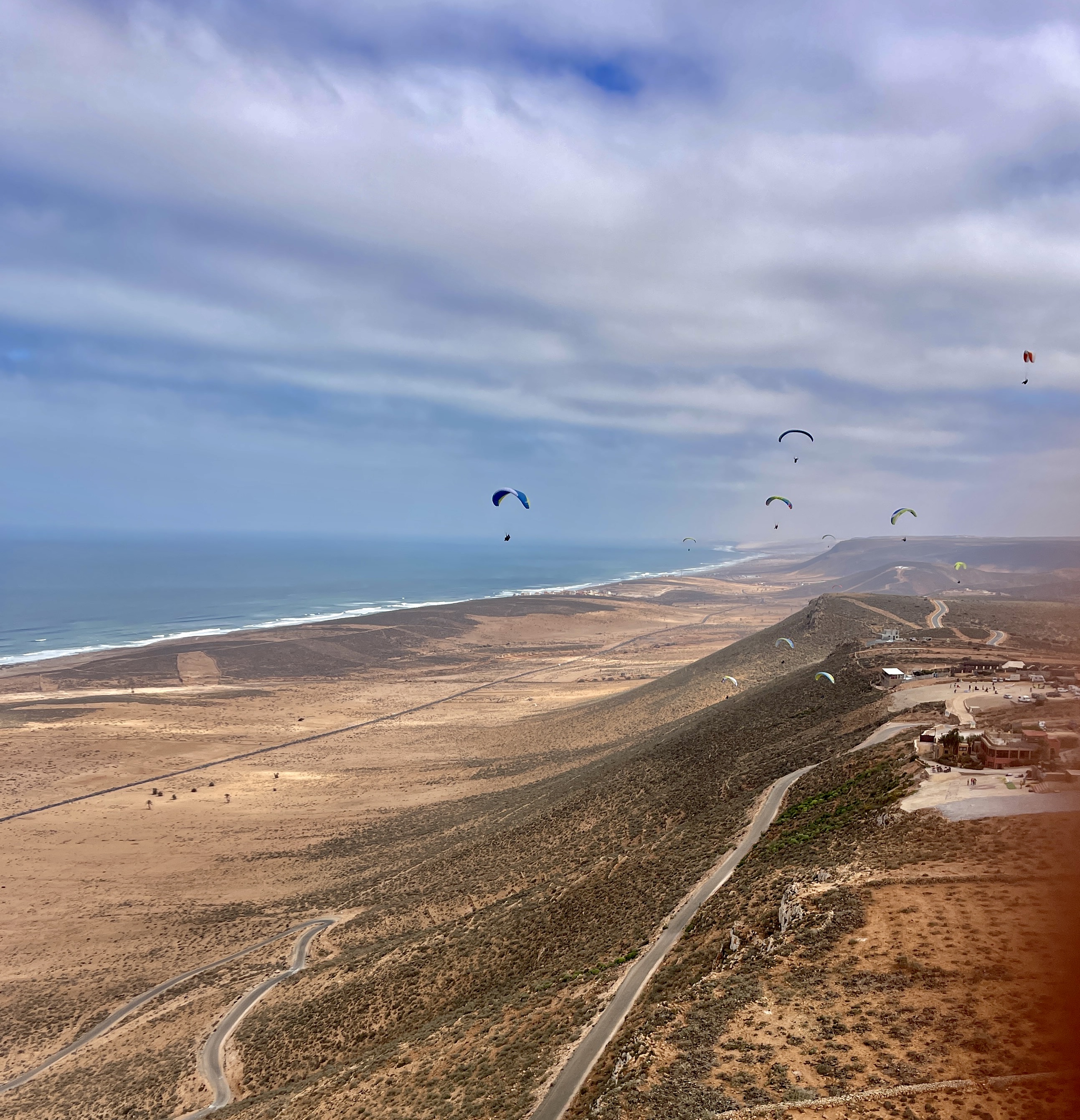 Paraglider Soaring along the Moroccan coastline